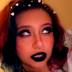 Amethyst, a 24-year-old female model posing for OnlyFans