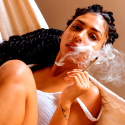 Stylish OnlyFans Model Smoking Cigarette