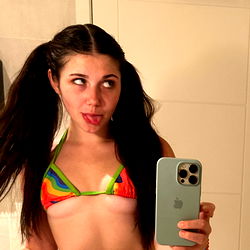 Young Woman Taking Selfie in Bikini