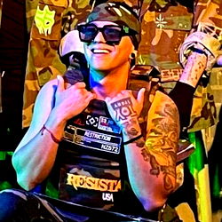 BabyChrys in a Camouflage Vest at Event