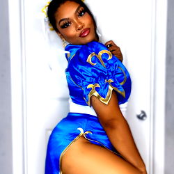 Cosplay Model in Blue Costume Posing