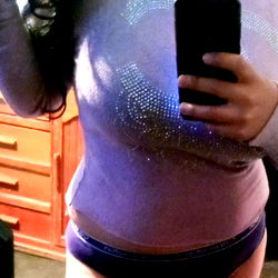 Liz, OnlyFans Model in Purple Shirt and Blue Jeans