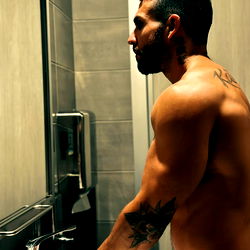 Muscular Man in Bathroom