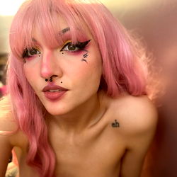 Stylish Female Model with Pink Hair