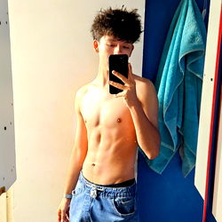 Fit Atashi Showcasing Abs and Short Hair