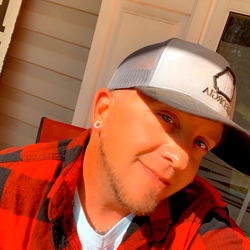 Me in front of a home sign, capturing the moment with a smile!