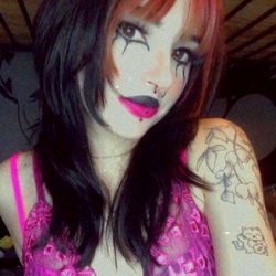 Violet Vix: Gothic Aesthetic with Red Hair and Tattoos