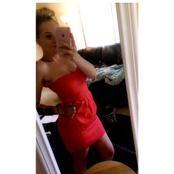 California Model Diamond Showcases Bold Red Dress in Full-Length Mirror