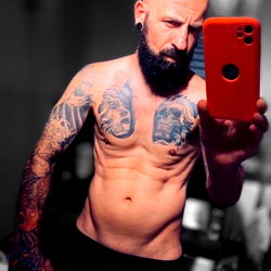 Fit Model Alex in Madrid, Showcasing His Tattoos and Abs