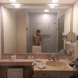 Model in Bathroom Mirror