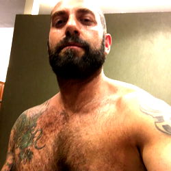 Bearded Man in Onlyfans Advertisement