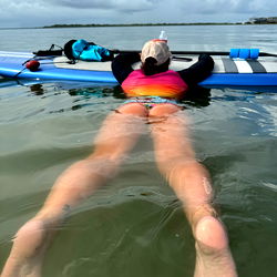 A Woman Paddleboarding