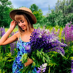 Alisa in Field of Flowers, Smiling and Posing with Bouquet