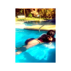 Poolside relaxation in a swimsuit