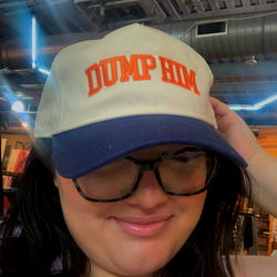 Model Showcasing Her Cap with a Humorous Message