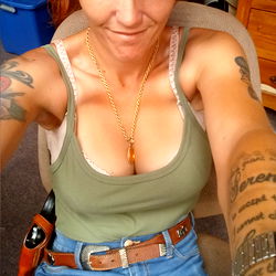 Miss Fragile, a tattooed individual with striking red hair. TOP 4% ONLYFANS