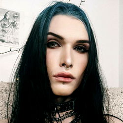 Stylized OnlyFans Model with Dark Hair and Heavy Eye Makeup