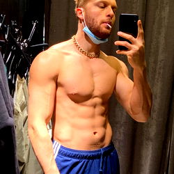 Shirtless Fitness Model Aman in a Chic Shopping Mall