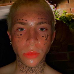 Gage - OnlyFans Model with Intricate Tattoos and Unique Look