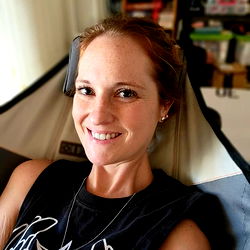 Moon Bunny Smiling in Laid-Back Environment with Tattoo Sleeve