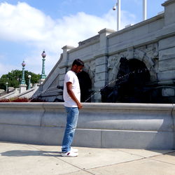 Model Drew Standing by Fountain in Park