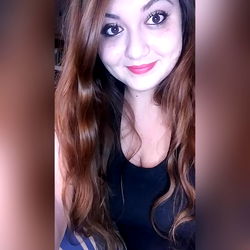 Woman with red hair and lipstick