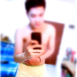 Person taking a selfie in bathroom