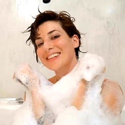 Alanis in a Playful Bathroom Moment