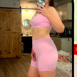 A model in purple athletic wear