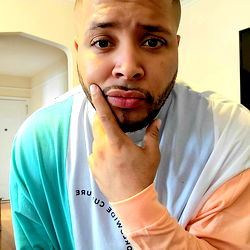 NYC Rapper Verse Kiing Ponders Life with a Hand on Chin