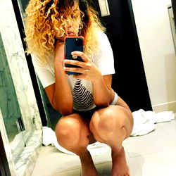 Vixen Stones - Sensual Model Posing in Bathroom Mirror