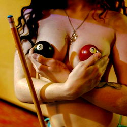 OnlyFans Model Deville / Beatrix, Showcasing Her Gaming Skills with Pool Sticks and Balls