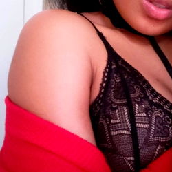 A woman in lingerie posing for the camera