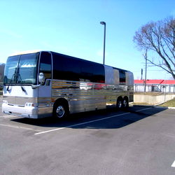 Vintage Silver and Black Bus on Parking Lot