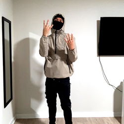 Rico69 in a casual pose