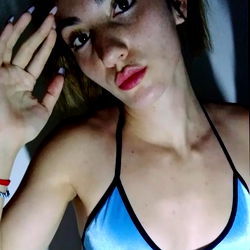 OnlyFans Model Afroditana Posing in a Blue Swimsuit