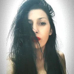 Stylish Woman with Dark Hair and Nose Ring