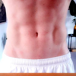 Fitness Model Showcases Abs and Workout Routine