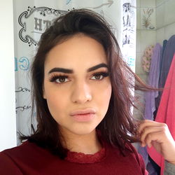 Glamorous Beauty Posing in Mirror