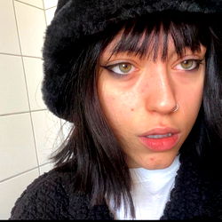 Zoe, Striking a Pose in Her Fur Coat and Beret