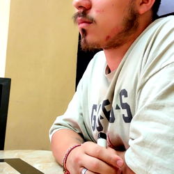 Man seated at a table in a restaurant