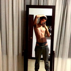 Alexxx, a model for OnlyFans, in the gym