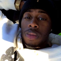 BIGSPANK in Casual Attire, Rests in Car