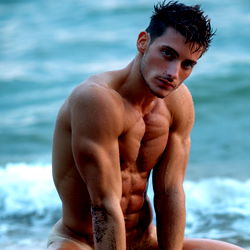 Fitness Model Mr. Anthon Showcases Muscular Physique on Beach