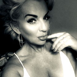 Blonde Woman in White Top