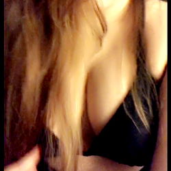 Model Showcasing Lingerie in an Intimate Setting