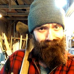 A Bearded Woodworker in a Shop