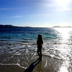 Amara Roux on a serene beach