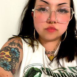 Avery, a Punk-inspired Style with Green Hair and Tattoos