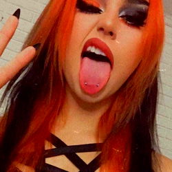 Singer KaylaCarnage, 25, Female, Red Hair with Orange Dye, Tattoos